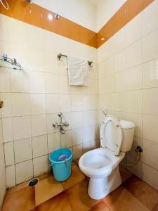 Koupelna v ubytování Nilgiris INN + 29 fotografií