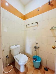 Koupelna v ubytování Nilgiris INN