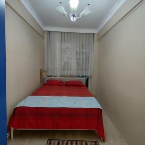 A bed or beds in a room at Nur home1