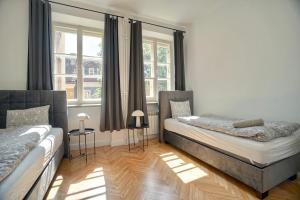 Posteľ alebo postele v izbe v ubytovaní Warsaw Premium Apartments Old Town