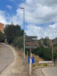a street sign on the side of a road at Villaggio Malfidano in Buggerru