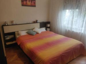 Giường trong phòng chung tại Home sweet home -Central & cozy