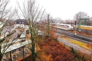 a train on the tracks at a train station at Celle Apartment for 6 people in Celle
