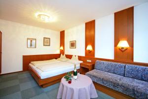 Posteľ alebo postele v izbe v ubytovaní Fleger Appartements