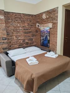 Ένα ή περισσότερα κρεβάτια σε δωμάτιο στο Sicilian Room