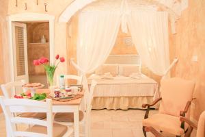 Postel nebo postele na pokoji v ubytování La casa di Nife by In Puglia service