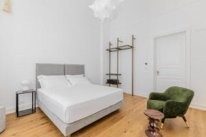 Letto o letti in una camera di Dome Hotel