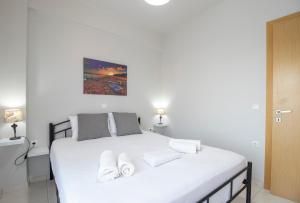 Postel nebo postele na pokoji v ubytování Comfy Beachside Flat with Seaview 2