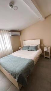Postel nebo postele na pokoji v ubytování Rota Star Hotel Beyoğlu