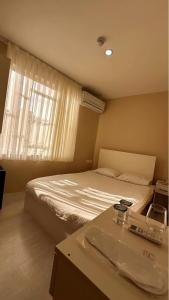 Postel nebo postele na pokoji v ubytování Rota Star Hotel Beyoğlu