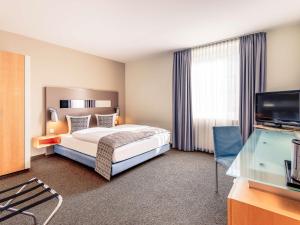 Postel nebo postele na pokoji v ubytování Mercure Hotel Düsseldorf City Nord