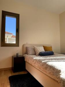 Ένα ή περισσότερα κρεβάτια σε δωμάτιο στο Villa Olive +28 φωτογραφίες