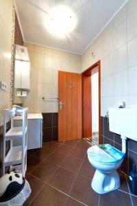 Et badeværelse på Apartment ADAM