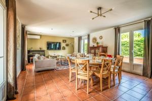 a dining room with a table and chairs at OIQIA • Occitane in Carcassonne +31 photos