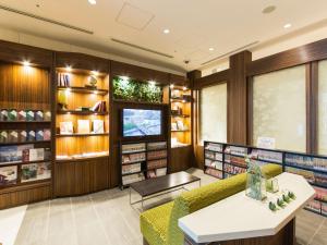 TV a/nebo společenská místnost v ubytování Hotel Keihan Yodoyabashi