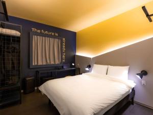 Postel nebo postele na pokoji v ubytování Ibis Styles Barretos