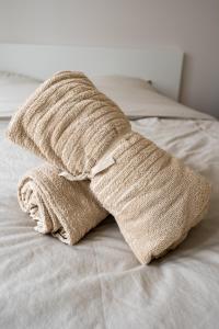 Postel nebo postele na pokoji v ubytování Villa Leone - Appart à 500m de la plage de Malo