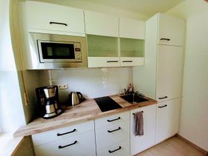 Kuchyň nebo kuchyňský kout v ubytování Wohnung Isarnähe