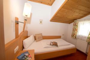 Łóżko lub łóżka w pokoju w obiekcie Hotel Glasererhaus