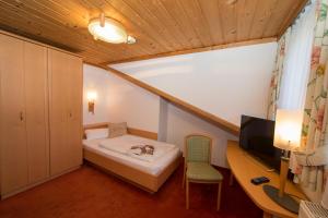 Łóżko lub łóżka w pokoju w obiekcie Hotel Glasererhaus
