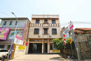 a building on the side of a street at Saloka Guest House & Residence in Cimahi