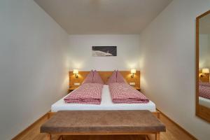 Postel nebo postele na pokoji v ubytování Berg- & Seeblick Pfefferbauer + 18 fotografií