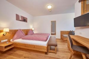 מיטה או מיטות בחדר ב-Berg- & Seeblick Pfefferbauer