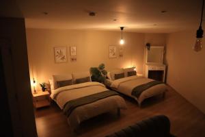 Voodi või voodid majutusasutuse Modern Studio Apartment in Cashel toas