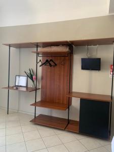TV a/nebo společenská místnost v ubytování Santuzza Art Hotel Catania