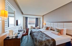 Krevet ili kreveti u jedinici u okviru objekta Sentido Kamelya Selin Luxury Resort & SPA