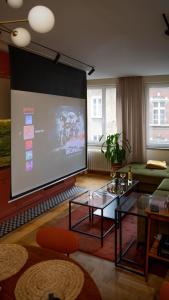 TV a/nebo společenská místnost v ubytování Rudy Kot + 21 fotografií