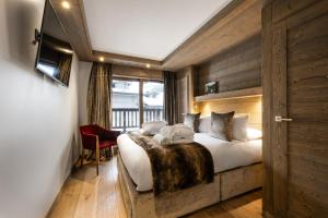 Postel nebo postele na pokoji v ubytování Le C by Alpine Resorts + 37 fotografií