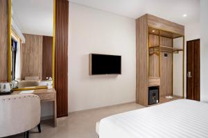 Letto o letti in una camera di The Amrta Borobudur