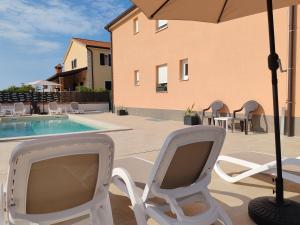 Bazén v ubytování Apartments Oleander Lovrečica-residence with pool nebo v jeho okolí