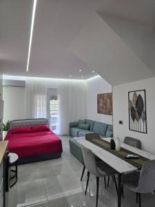 Postel nebo postele na pokoji v ubytování Duka Apartment