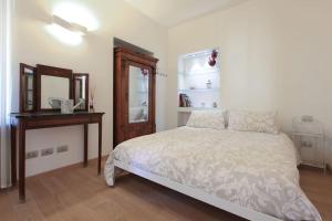 Ένα ή περισσότερα κρεβάτια σε δωμάτιο στο Nice and chic Apt near Fiera Milano