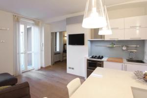 Η κουζίνα ή μικρή κουζίνα στο Nice and chic Apt near Fiera Milano