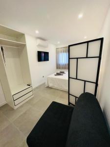 Televisyen dan/atau pusat hiburan di Zulia Suites, Masca, Teide, Los Gigantes, Excursions, AC, Wifi-4