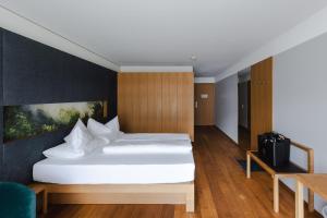 Posteľ alebo postele v izbe v ubytovaní Sonne Mellau - Feel good Hotel