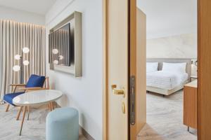 Postel nebo postele na pokoji v ubytování Le Meridien Lav Split