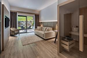 a living room with a couch and a table at Cervino - VRetreats in Breuil-Cervinia