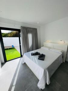 Katil atau katil-katil dalam bilik di Zulia Suites, Masca, Teide, Los Gigantes, Excursions, AC, Wifi-2
