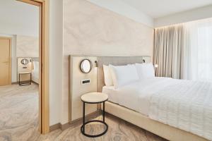 Postel nebo postele na pokoji v ubytování Le Meridien Lav Split