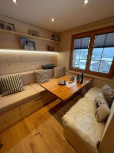 Un lugar para sentarse en Chalet La Montanara