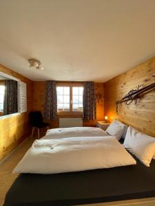 Una cama o camas en una habitación de Chalet La Montanara