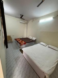 Postel nebo postele na pokoji v ubytování Pipewalas house