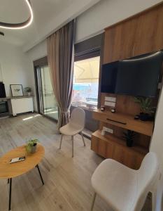 TV a/nebo společenská místnost v ubytování Casa di Bello