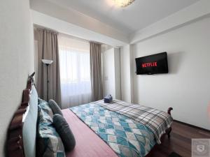 TV a/nebo společenská místnost v ubytování RentHouse Apartments - Feel Like Home