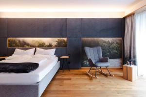 Posteľ alebo postele v izbe v ubytovaní Sonne Mellau - Feel good Hotel