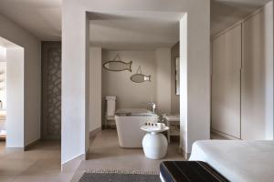 Posteľ alebo postele v izbe v ubytovaní Eagles Villas - Small Luxury Hotels of The World